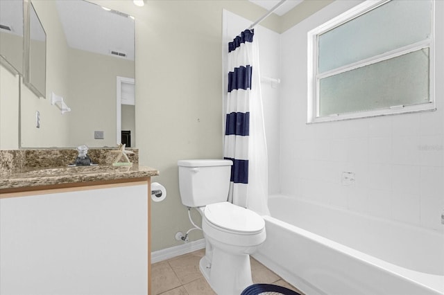 full bathroom featuring tile patterned flooring, vanity, toilet, and shower / bath combo with shower curtain