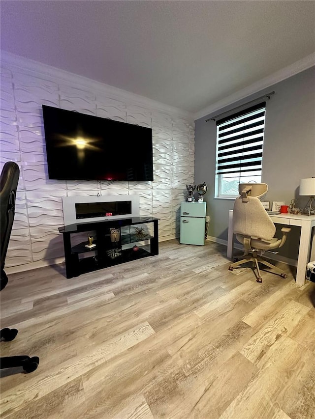 office featuring ornamental molding and light wood-type flooring