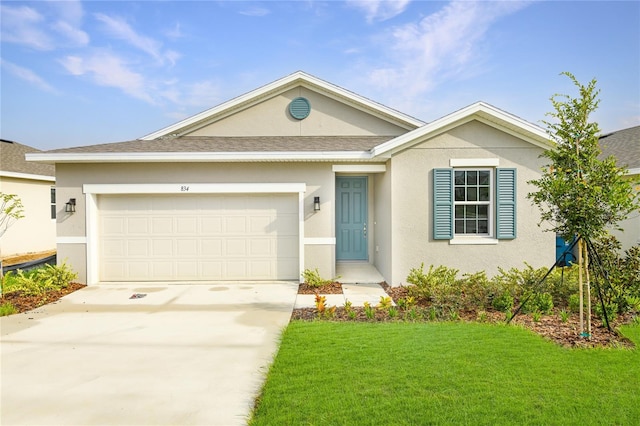 ranch-style house with a front lawn and a garage