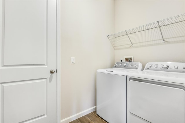 laundry room with washing machine and dryer