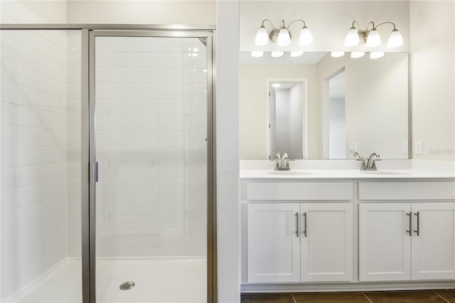 bathroom with vanity and an enclosed shower