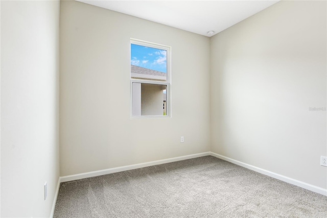 empty room featuring carpet flooring