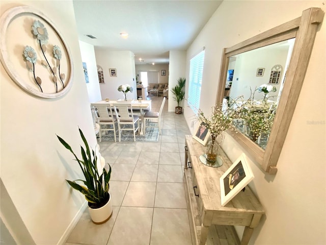 hallway with light tile patterned flooring