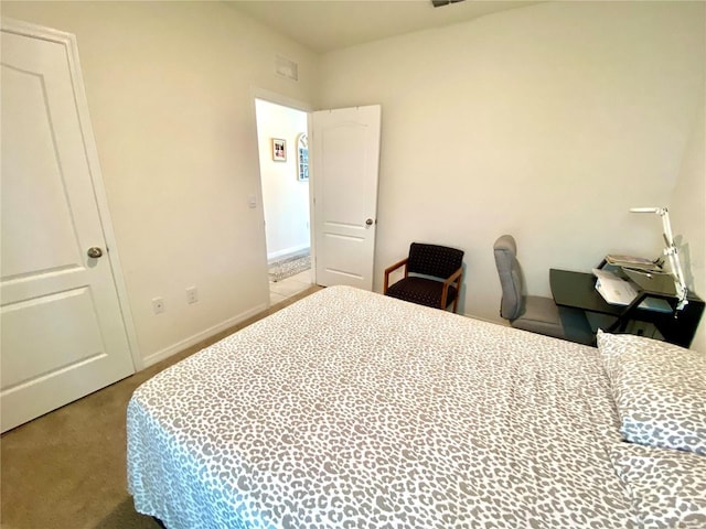 bedroom with light colored carpet