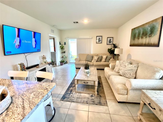 living room featuring light tile patterned floors