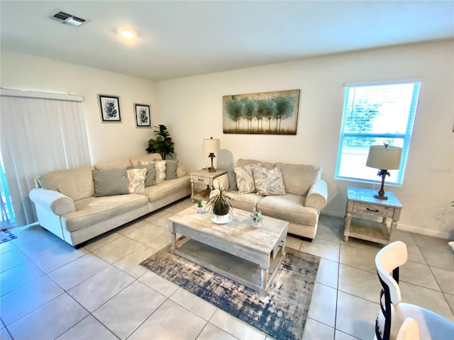 living room featuring light tile patterned floors