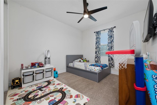 bedroom with carpet and ceiling fan