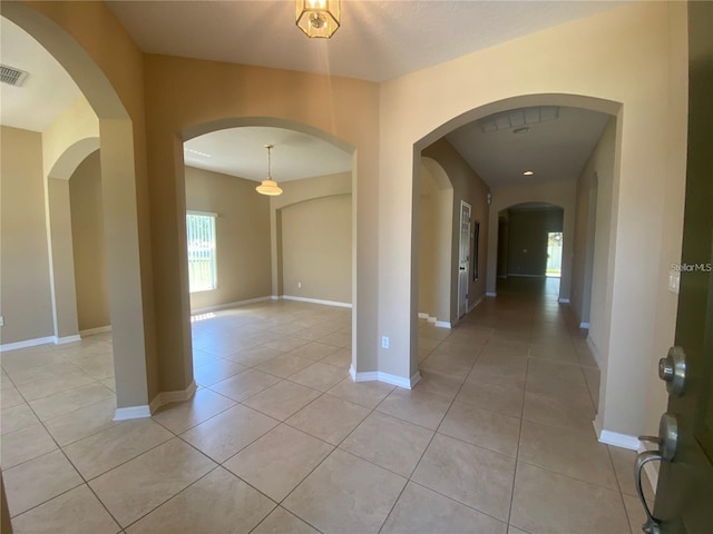 interior space featuring light tile floors