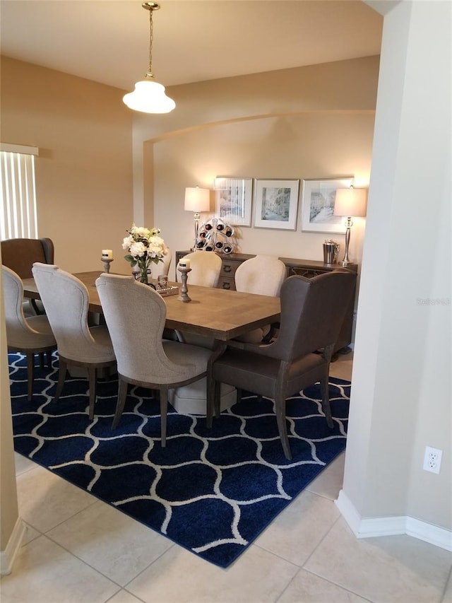 dining area with tile floors