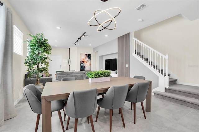 dining area with a chandelier