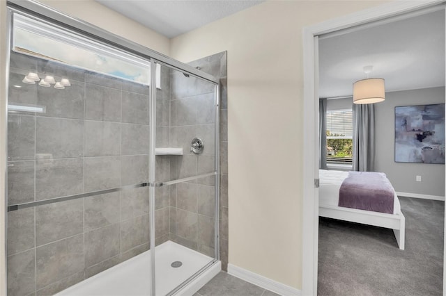 bathroom with a shower with shower door