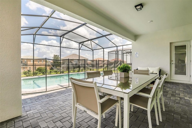 view of patio with a fenced in pool and a lanai