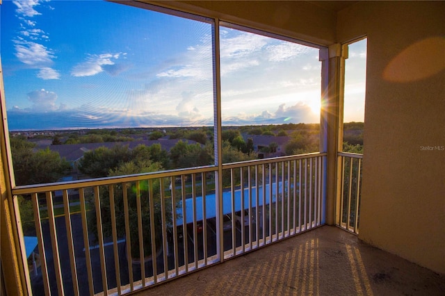 view of balcony at dusk