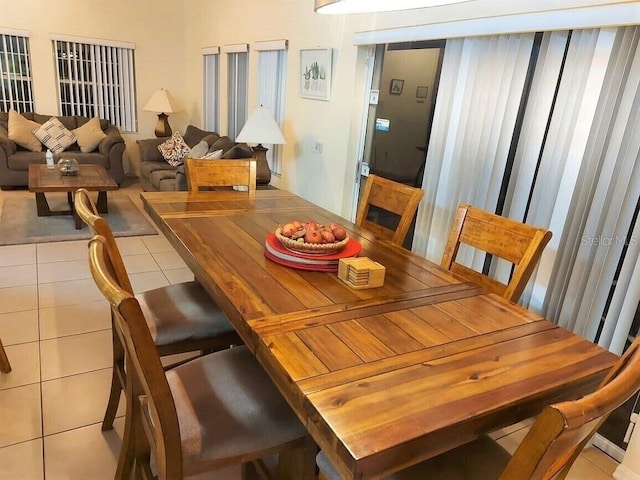 view of tiled dining space