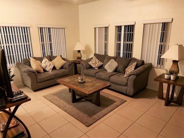 living room featuring light tile floors