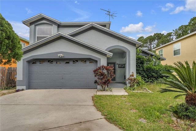 view of front of home with a garage