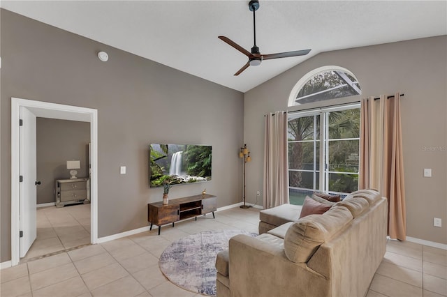 living room with light tile patterned floors, vaulted ceiling, and ceiling fan