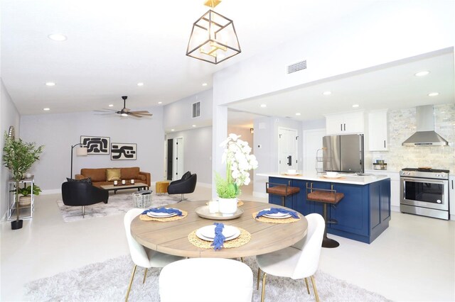 dining area with ceiling fan