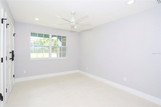 spare room featuring ceiling fan