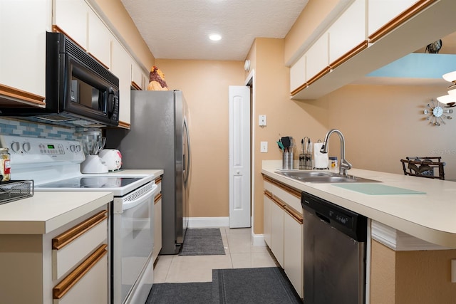 kitchen featuring white cabinets, electric range, sink, dishwasher, and light tile floors