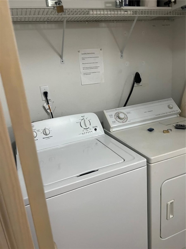 laundry area featuring washing machine and dryer