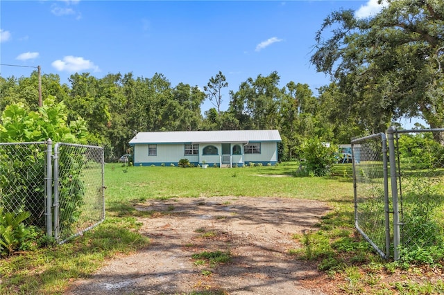 ranch-style house with a front yard