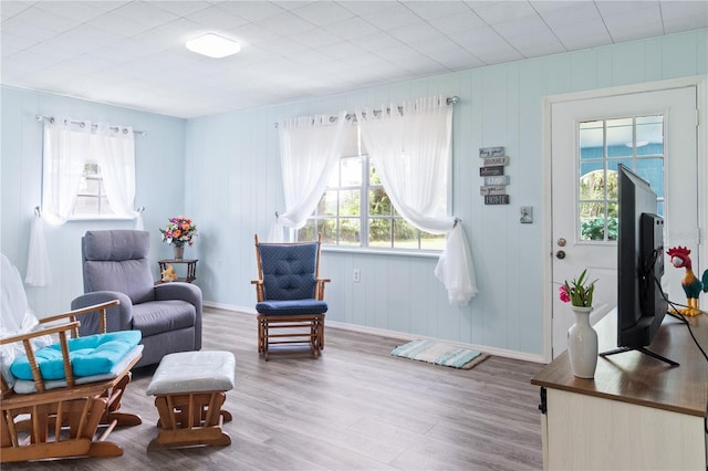 sitting room featuring hardwood / wood-style floors