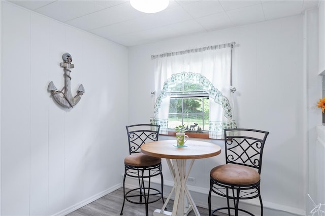 dining room featuring wood-type flooring