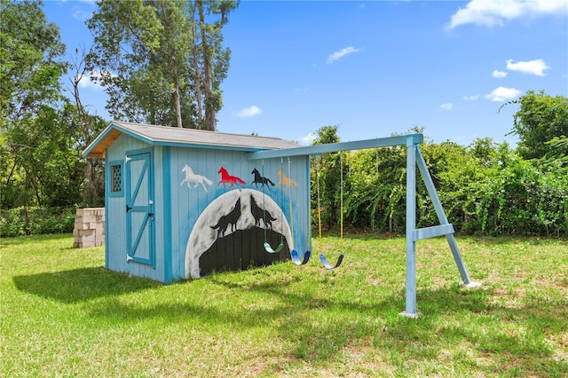 view of outbuilding featuring a lawn