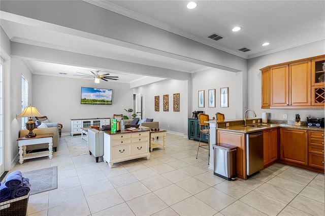 kitchen with sink, crown molding, light tile patterned floors, kitchen peninsula, and dishwasher