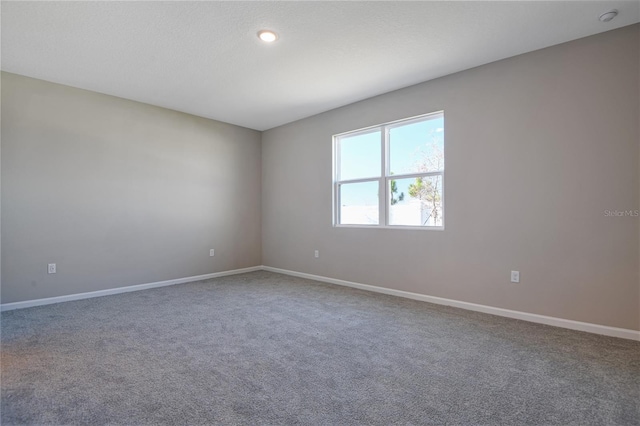 spare room with carpet flooring