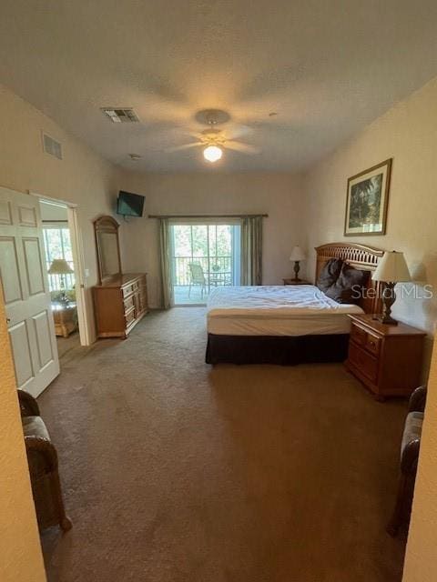 carpeted bedroom featuring access to outside and ceiling fan