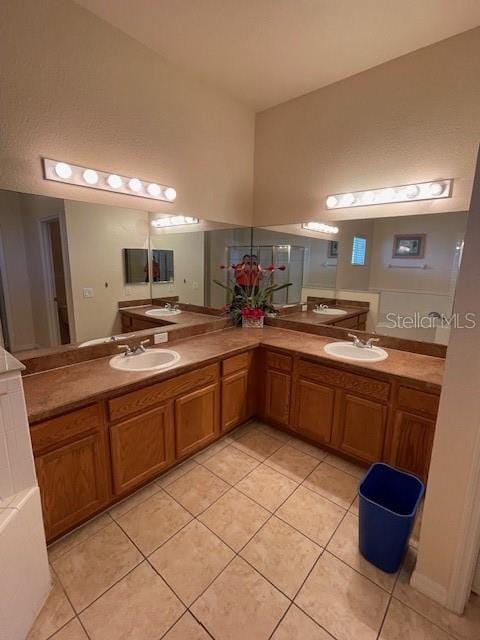 bathroom featuring dual vanity and tile patterned flooring