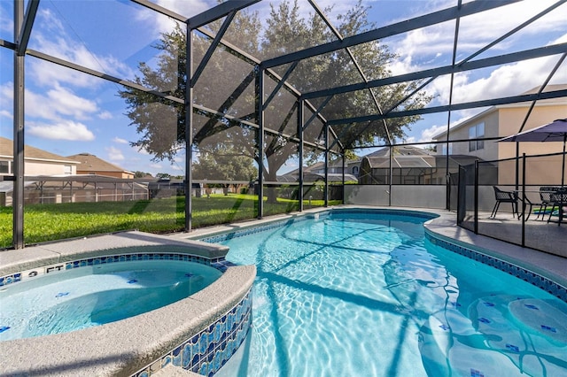 view of swimming pool with a lanai, a yard, and an in ground hot tub