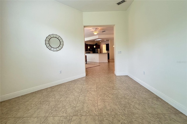 unfurnished room with ceiling fan