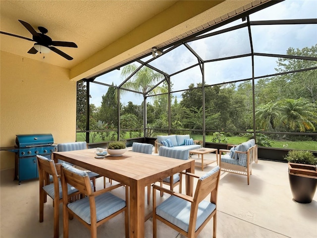 view of patio with a lanai, ceiling fan, and an outdoor hangout area