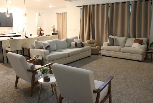 living room featuring light colored carpet