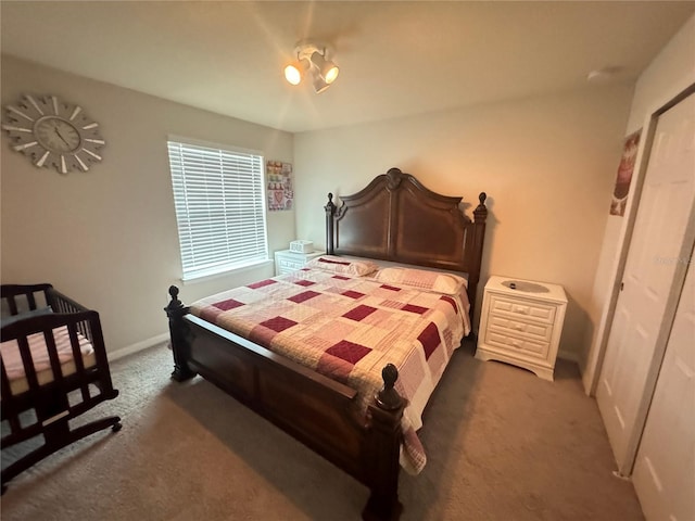 bedroom featuring dark carpet