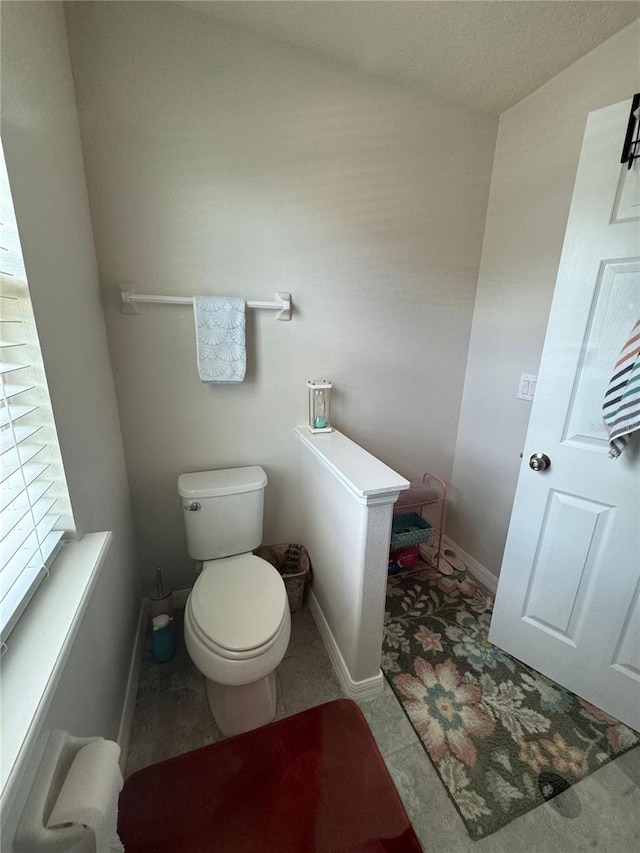 bathroom featuring toilet