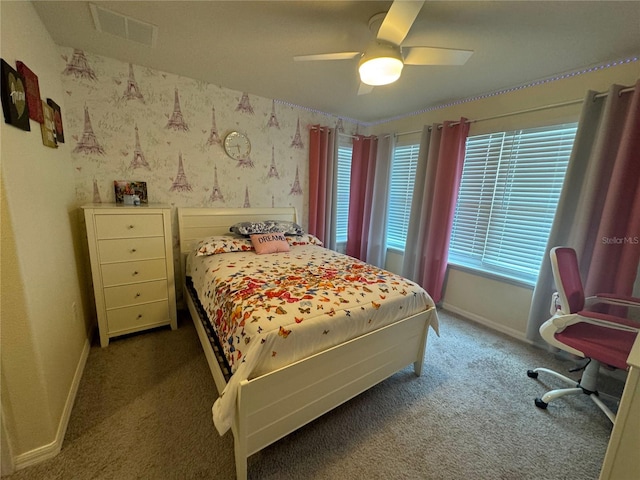 bedroom with ceiling fan and carpet