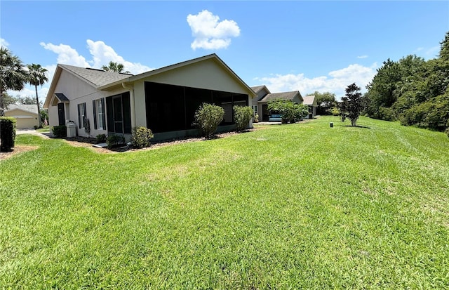 view of yard with a sunroom