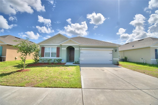 ranch-style house featuring a garage and a front lawn