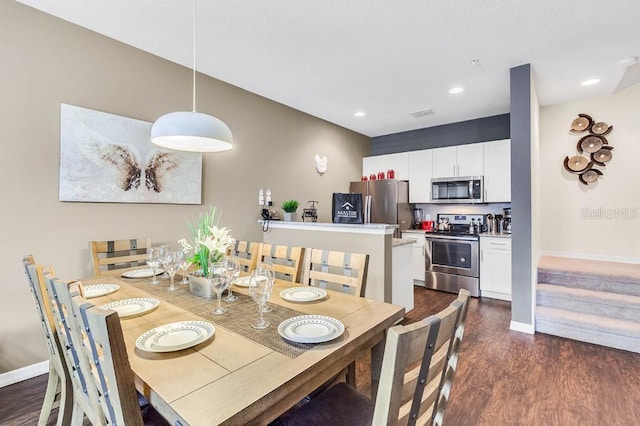 dining area with stairway, baseboards, dark wood-style flooring, and recessed lighting