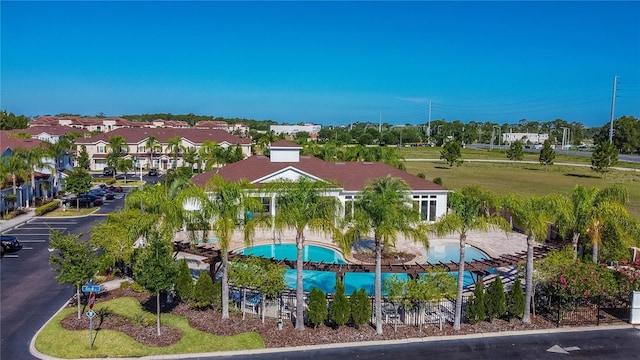 surrounding community featuring a swimming pool