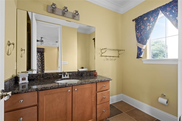 bathroom with vanity, crown molding, ceiling fan, and tile patterned floors