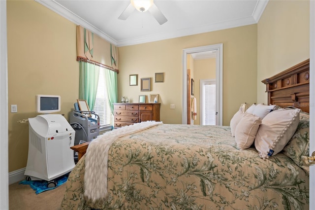 bedroom with ornamental molding, ceiling fan, and carpet flooring