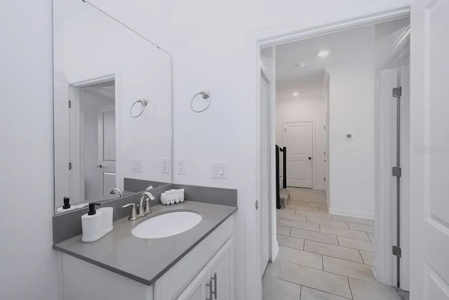 bathroom with vanity and tile patterned flooring