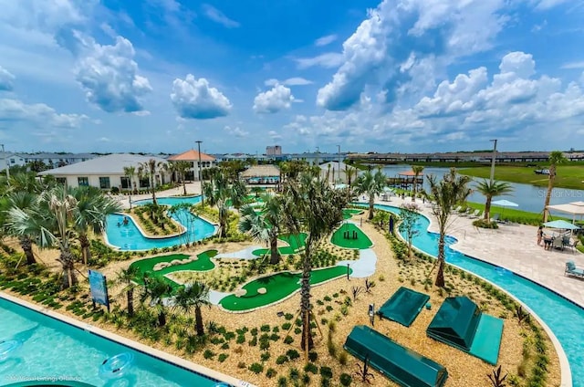 view of swimming pool with a water view