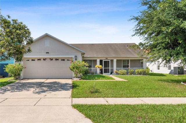 ranch-style home featuring a porch, a garage, cooling unit, and a front lawn