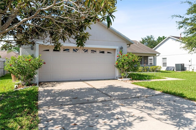 ranch-style home with a garage, a front yard, and cooling unit